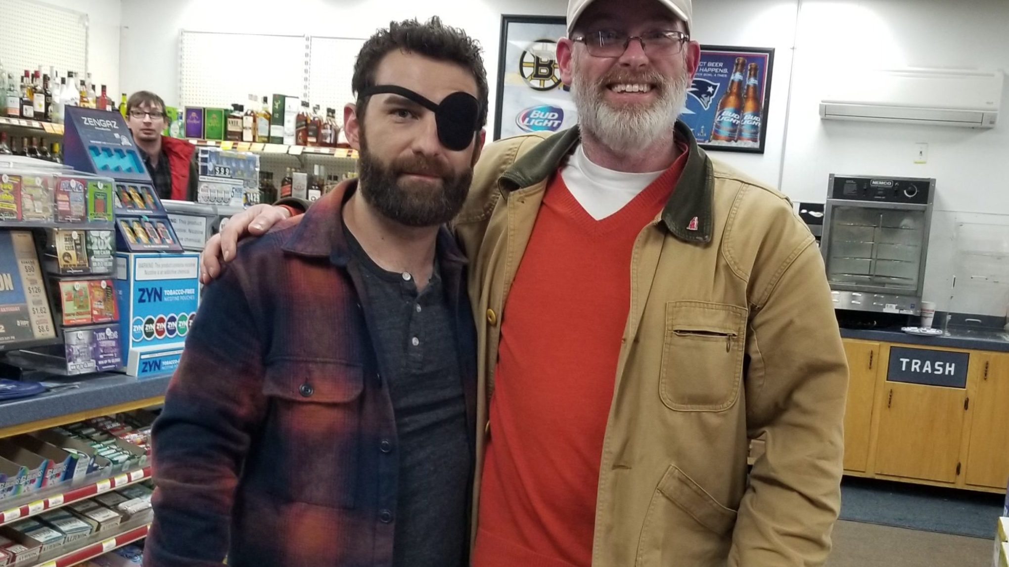 a man standing in front of a store