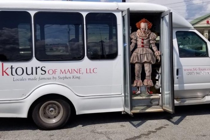 a van parked on the side of a road